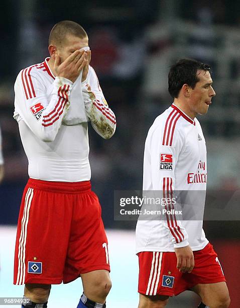 Mladen Petric and Piotr Trochowski of Hamburg look dejected after the Bundesliga match between Hamburger SV and Eintracht Frankfurt at HSH Nordbank...