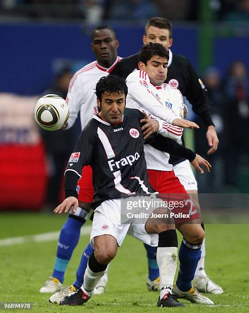 Tomas Rincon of Hamburg and Selim Teber of Frankfurt battle for the ball during the Bundesliga match between Hamburger SV and Eintracht Frankfurt at...