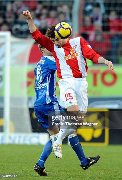 Andreas Ivanschitz of Mainz battles for the ball with Andreas Johansson of Bochum during the Bundesliga match between FSV Mainz 05 and VFL Bocuhm at...