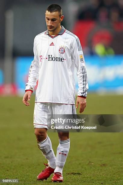 Diego Contento of Bayern looks dejected after the 1-1 draw of the Bundesliga match between 1. FC Nuernberg and FC Bayern Muenchen at Easy Credit...
