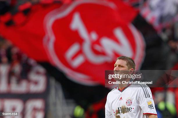 Bastian Schweinsteiger of Bayern looks dejected after the 1-1 draw of the Bundesliga match between 1. FC Nuernberg and FC Bayern Muenchen at Easy...