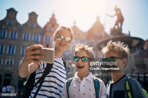 kids tourists sightseeing city of gdansk, poland - gdansk stock pictures, royalty-free photos & images