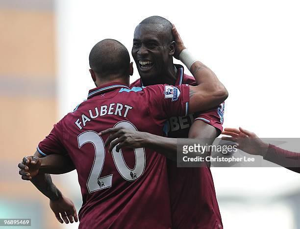 Carlton Cole of West Ham celebrates scoring their second goal with Julien Faubert during the Barclays Premier League match between West Ham United...
