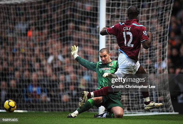 Carlton Cole of West Ham scores their second goal during the Barclays Premier League match between West Ham United and Hull City at Boleyn Ground on...