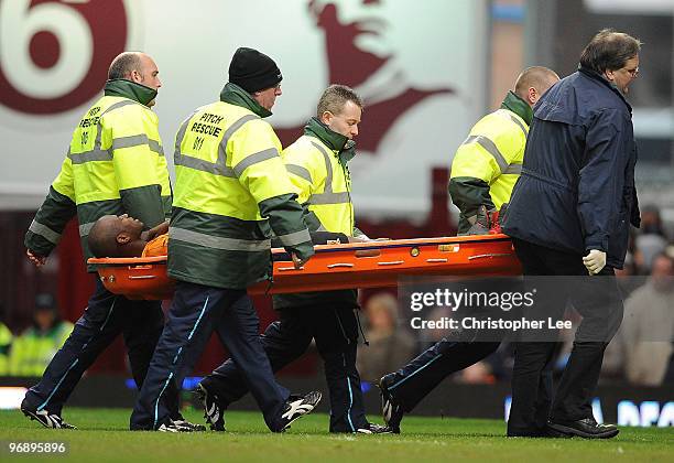 Anthony Gardner of Hull is stretcherd off during the Barclays Premier League match between West Ham United and Hull City at Boleyn Ground on February...