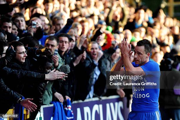 John Terry of Chelsea applaudes his fans after winning the Barclays Premier League match between Wolverhampton Wanderers and Chelsea at Molineux on...