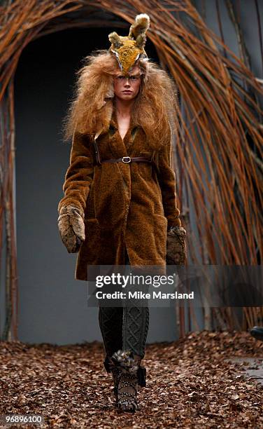 Model walks the runway at the Unique show for London Fashion Week Autumn/Winter 2010 at TopShop Venue on February 20, 2010 in London, England.