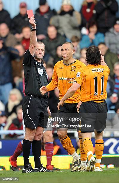 Craig Fagan of Hull is sent off by referee Martin Atkinson during the Barclays Premier League match between West Ham United and Hull City at Boleyn...