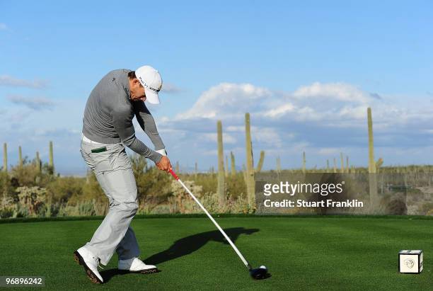 Camilo Villegas of Colombia tees off on the fifth tee box during round four of the Accenture Match Play Championship at the Ritz-Carlton Golf Club on...