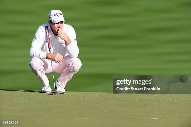 Oliver Wilson of England lines up a putt on the seventh hole during round four of the Accenture Match Play Championship at the Ritz-Carlton Golf Club...