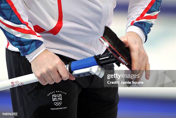 Detail of a member of the Great Britian team during the men's curling round robin game against China on day 9 of the Vancouver 2010 Winter Olympics...