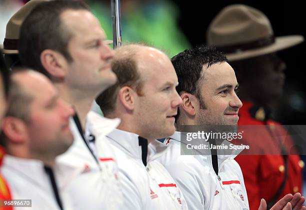Skip David Murdoch of Great Britain and Northern Ireland is introduced along with teammates Euan Byers, Pete Smith, and Ewan MacDonald during the...