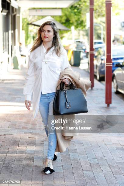 Designer Vanessa Moe wearing Vanessa Moe coat, white shirt, Marks and Spencer jeans, Fendi bag, Zara shoes and Linda Farrow sunglasses on June 7,...