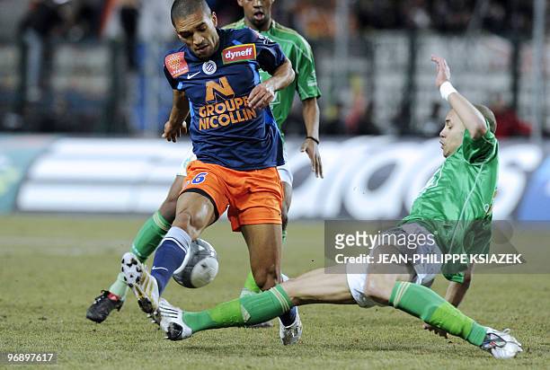 Montpellier's midfielder Joris Marveaux vies with Saint-Etienne�s defender Yohan Benalouane during the French L1 football match Saint-Etienne vs...
