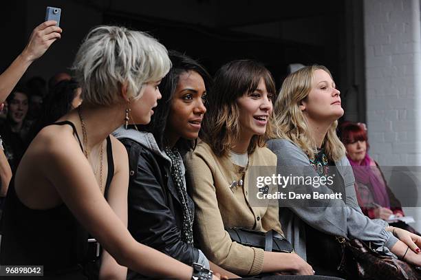 Pixie Geldof, Remi Nicole and Alexa Chung in the front row at the Topshop Unique show in Covent Garden on February 20, 2010 in London, England.