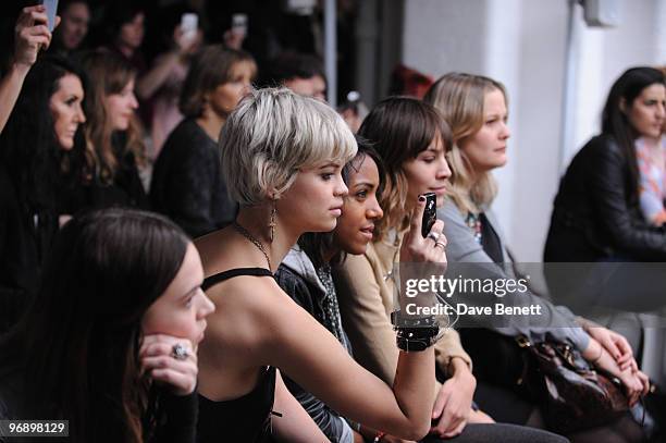 Pixie Geldof, Remi Nicole and Alexa Chung in the front row at the Topshop Unique show in Covent Garden on February 20, 2010 in London, England.