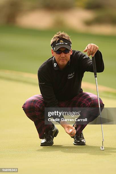 Ian Poulter of England lines up a putt on the 14th hole during round four of the Accenture Match Play Championship at the Ritz-Carlton Golf Club on...