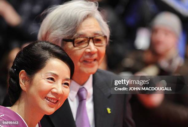 Japanese director Yoji Yamada and Japanese actress Sayuri Yoshinaga pose for photographers on the red carpet for the awards ceremony of the 60th...