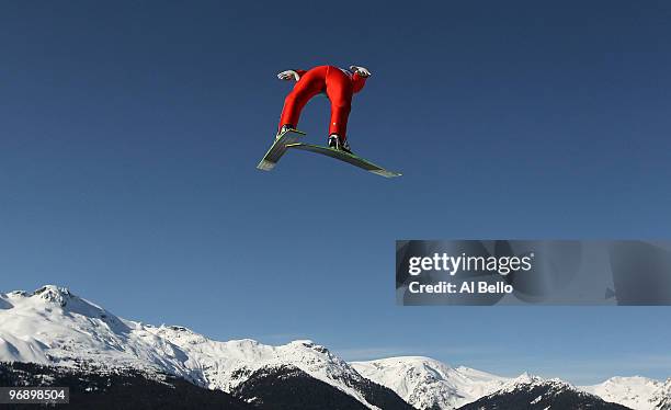 Thomas Morgenstern of Austria soars off the Large Hill on day 9 of the 2010 Vancouver Winter Olympics at Ski Jumping Stadium on February 20, 2010 in...