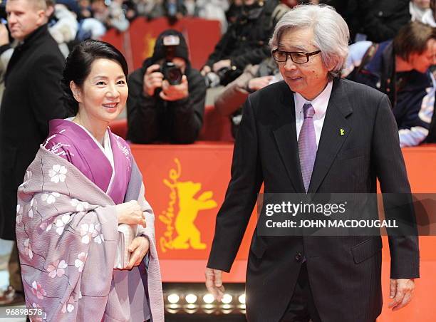 Japanese director Yoji Yamada and Japanese actress Sayuri Yoshinaga pose for photographers on the red carpet for the awards ceremony of the 60th...