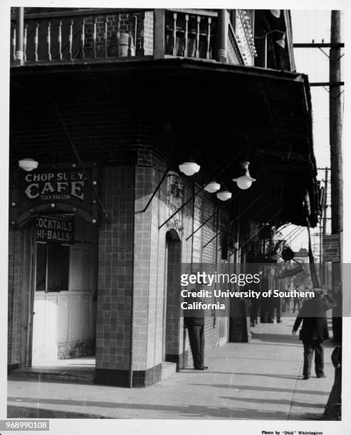 Man standing outside Tuey Far Low Cafe, , Los Angeles, California, early to mid twentieth century.