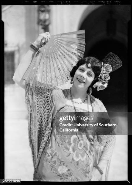 Men and women in costume, fiesta scene shots, Mission Playhouse, Mission San Gabriel Arcangel, San Gabriel, California, 1927.