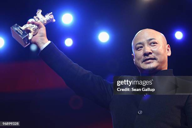 Director Wang Quan'an receives the Silver Bear for Best Script of 'Tuan Yuan' at the Awards Ceremony during day ten of the 60th Berlin International...