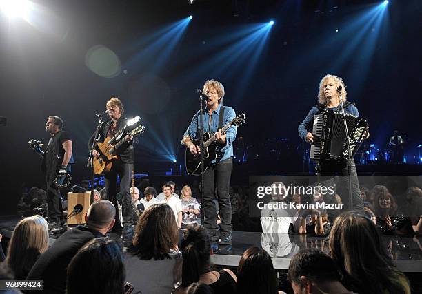 Exclusive* Tico Torres, Richie Sambora, Jon Bon Jovi and David Bryan of Bon Jovi perform at Key Arena on February 19, 2010 in Seattle, Washington.