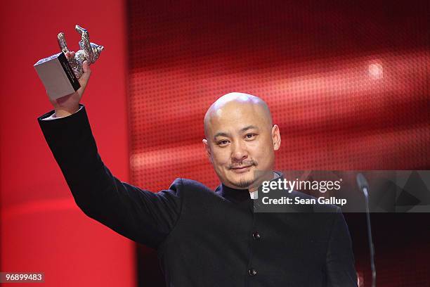 Director Wang Quan'an receives the Silver Bear for Best Script of 'Tuan Yuan' at the Awards Ceremony during day ten of the 60th Berlin International...