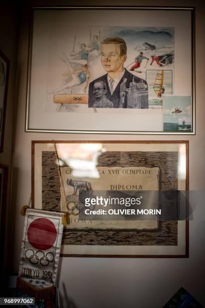 Souvenirs of the Rome and Tokyo Olympic Games in 1960 and 1964 of former Finnish Olympic gymnastics athlete, Kauko Heikkinen are photographed at his...