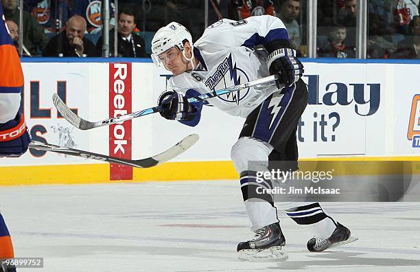 Kurtis Foster of the Tampa Bay Lightning skates against the New York Islanders on February 13, 2010 at Nassau Coliseum in Uniondale, New York. The...