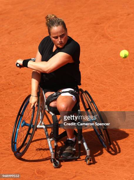 Aniek Van Koot of The Netherlands competes in the ladies singles wheelchair first round match against Kgothatso Montjane of South Africa during day...