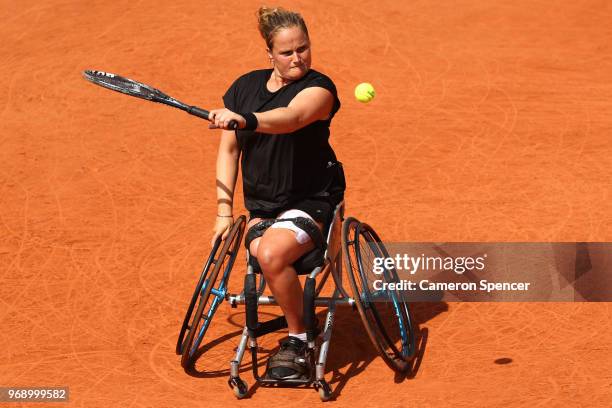 Aniek Van Koot of The Netherlands competes in the ladies singles wheelchair first round match against Kgothatso Montjane of South Africa during day...