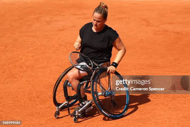 Aniek Van Koot of The Netherlands competes in the ladies singles wheelchair first round match against Kgothatso Montjane of South Africa during day...