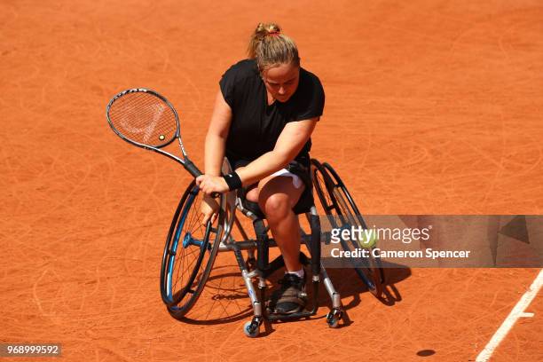 Aniek Van Koot of The Netherlands competes in the ladies singles wheelchair first round match against Kgothatso Montjane of South Africa during day...
