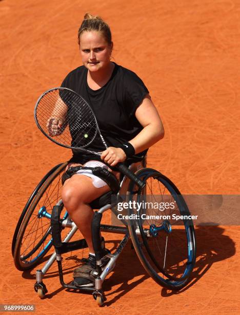 Aniek Van Koot of The Netherlands competes in the ladies singles wheelchair first round match against Kgothatso Montjane of South Africa during day...