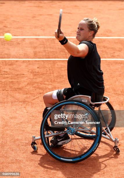 Aniek Van Koot of The Netherlands competes in the ladies singles wheelchair first round match against Kgothatso Montjane of South Africa during day...