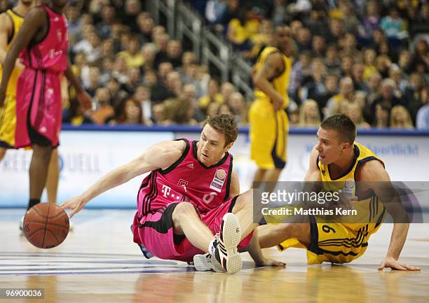 Steffen Hamann of Berlin battles for the ball with Johannes Strasser of Bonn during the Beko Basketball Bundesliga match between Alba Berlin and...