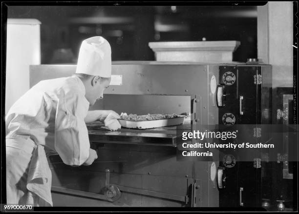 Man in chef's hat cooking, Southern California, 1930.