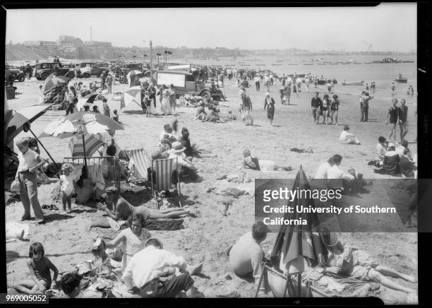 People at beach and outboard motor races, Cabrillo Beach, Los Angeles, California, 1931.