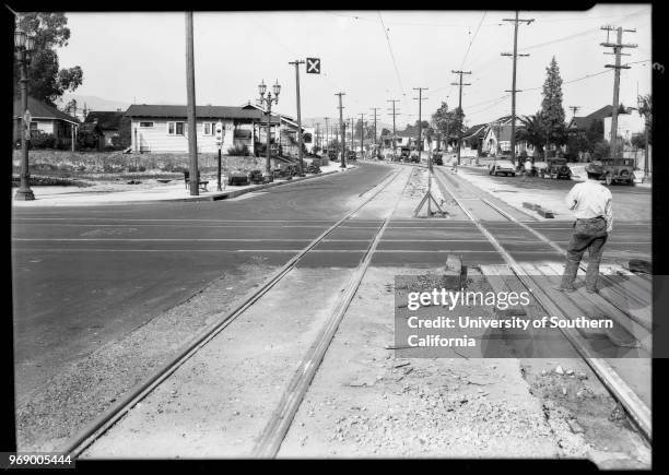 Road construction at Santa Monica Boulevard and North Virgil Avenue, Los Angeles, California, 1931.