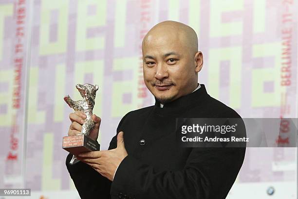 Director Wang Quan'an poses with the Silver Bear for Best Script of 'Tuan Yuan' at the 'Award Winners' Press Conference during day ten of the 60th...