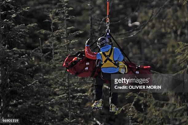 Romania's Edith Miklos is airlifted after a crash during the Women's Vancouver 2010 Winter Olympics Downhill event at Whistler Creek side Alpine...