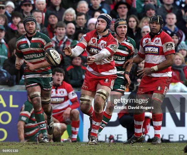 Dave Attwood of Gloucester passes the ball during the Guinness Premiership match between Leicester Tigers and Gloucester at Welford Road on February...