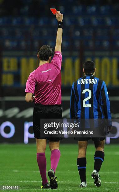 Ivan Cordoba of FC Internazionale Milano receives the red card from referee Paolo Tagliavento during the Serie A match between FC Internazionale...