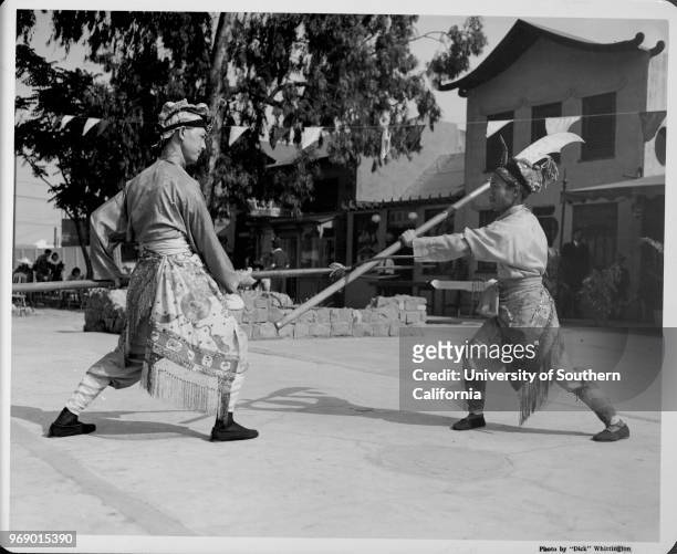 Chinatown, fighting demonstration, costumes, Los Angeles, California, 1939.