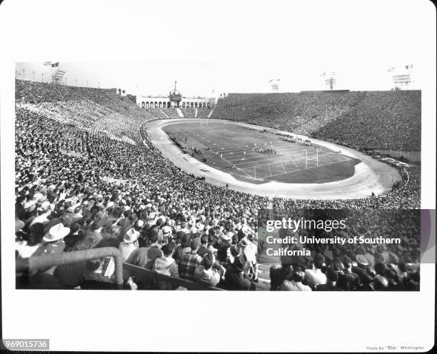 Panoramic view of the inside of the Los Angeles Memorial Coliseum with a capacity crowd, Los Angeles, California, early to mid twentieth century.