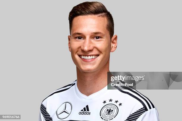 Julian Draxler poses for a photo during a portrait session ahead of the 2018 FIFA World Cup Russia at Eppan training ground on June 5, 2018 in Eppan,...