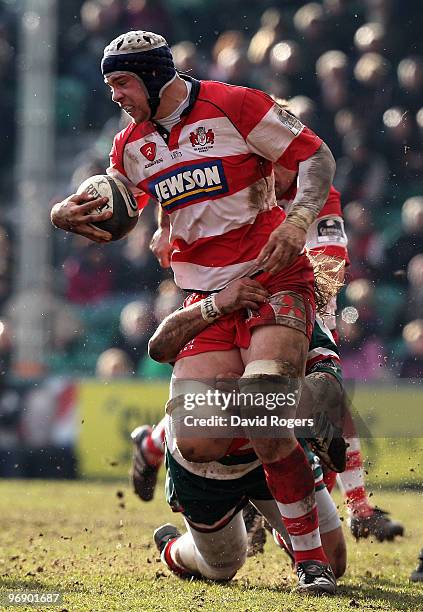Dave Attwood of Gloucester charges upfield during the Guinness Premiership match between Leicester Tigers and Gloucester at Welford Road on February...