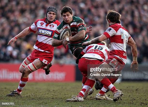 Ben Youngs of Leicester is stopped by Olly Morgan during the Guinness Premiership match between Leicester Tigers and Gloucester at Welford Road on...